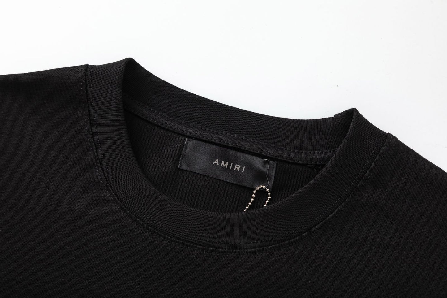 Playera Amiri