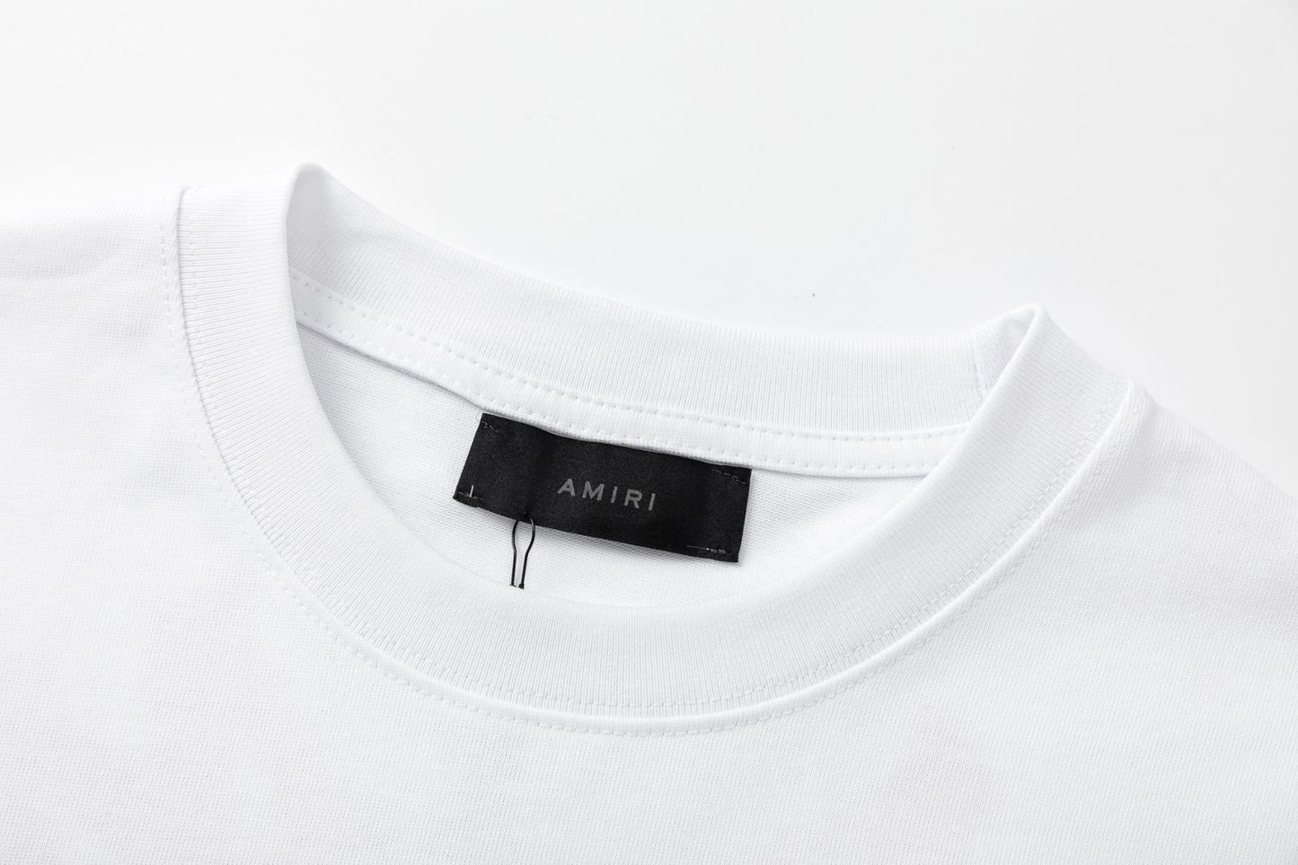 Playera Amiri