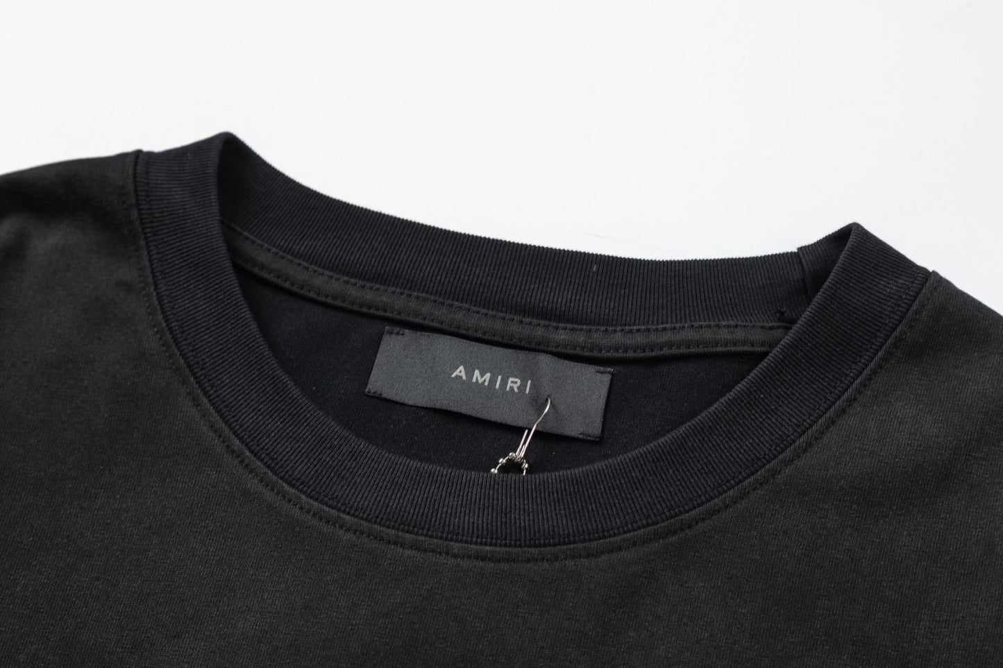 Playera Amiri